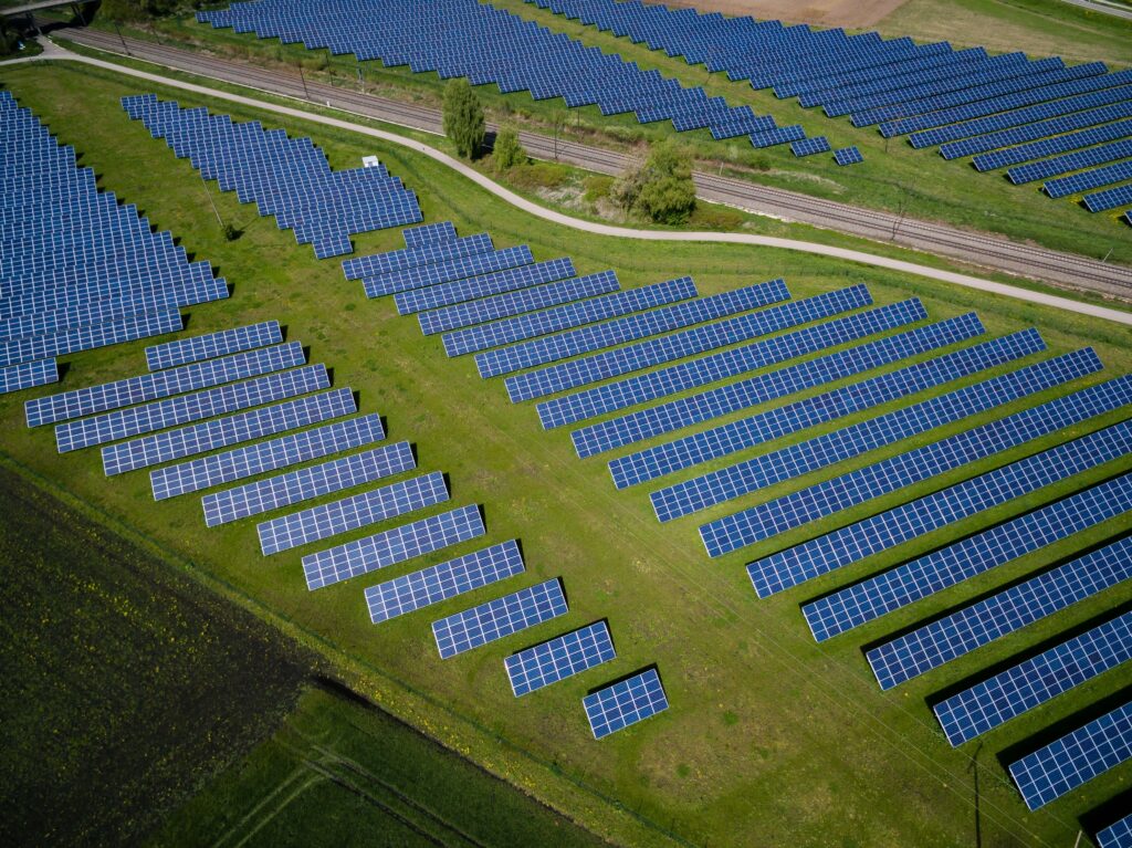 a solar farm on green grass